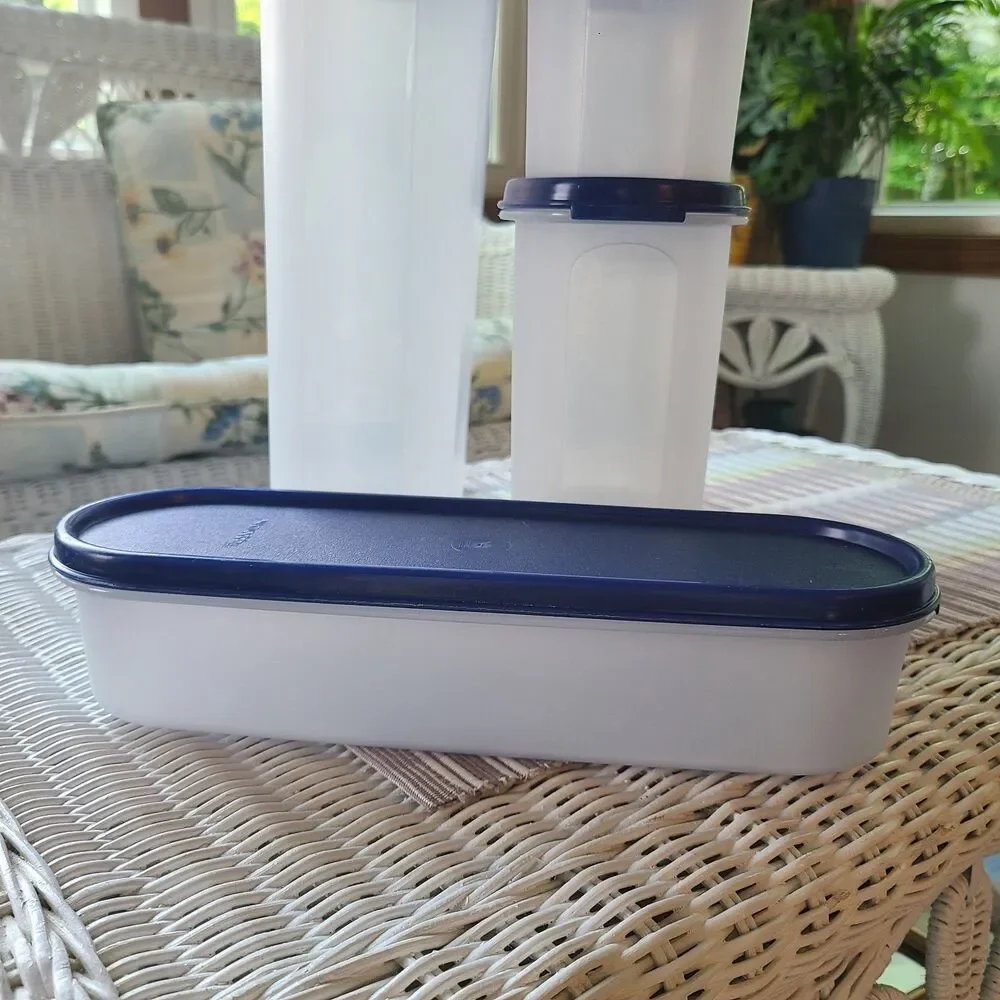 Vintage Tupperware Modular Mates Super Oval Pantry Set Four Piece Set Blue Lids